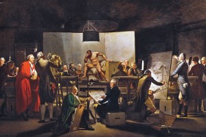 Aktklasse einer Kunstakademie. Viele Künstler malen einen nackten Mann.