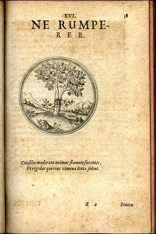 Seite von einem alten buch, mit einem schriftzug als Titel und darunter in einem Kreis ein Baum